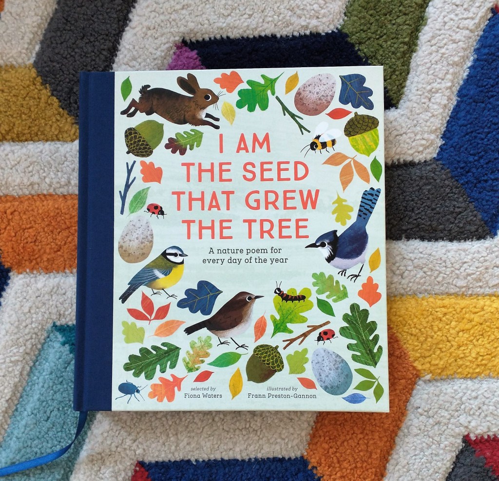 I Am The Seed That Grew The Tree: A nature poem for every day of the year edited by Fiona Waters and illustrated by Fran Preston-Gannon on a colourful rug